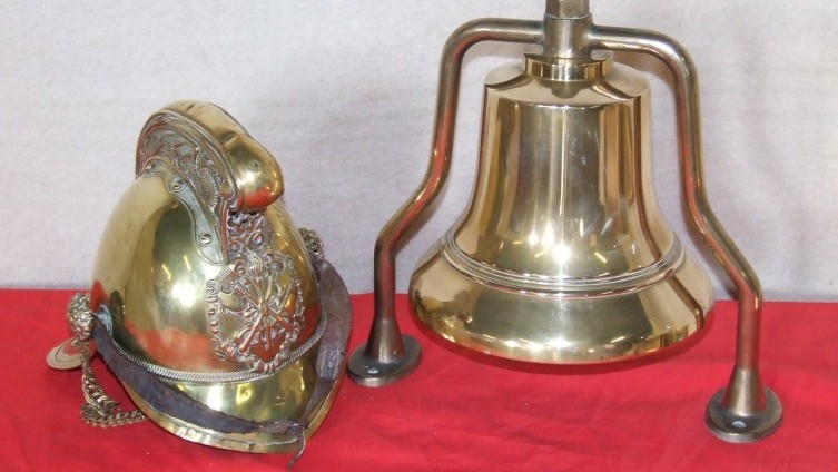 c.1900 Fireman's helmet £500 & fire bell £170