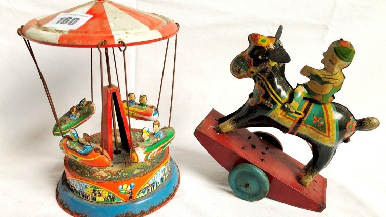 Two Tin Plate Clockwork Toys - £48