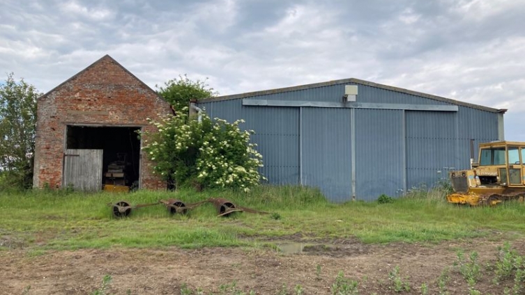 LOT 1 – 5 Acres Agricultural building and land to the rear including a small reservoir